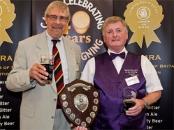 Roger Protz (left) presents John Boyce of Mighty Oak with the Champion Beer of Britain 2011 award