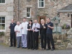 The owners and staff at East Haugh House celebrate winning their award