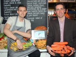 Imperial head chef Tom Hope and the Mayor's environment adviser Matthew Pencharz with the weight equivalent in vegetables of the food the Imperial is saving each month