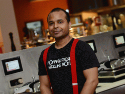 Waiter Akhil Bisht is pictured at the £1.5 million Jimmy's World Grill & Bar which will open next month in Derby