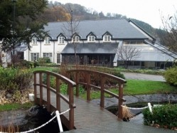 The Wild Pheasant hotel in Llangollen has been bought out of administration just over a year after its parent company collapsed