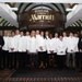Simon Beaumont, director of Cclinary at Marriott International (far left), handed over the chef whites to the first Marriott Culinary Apprentices in London