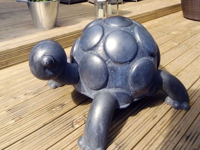 Sculptor Mick Kirby-Geddes' turtle made from scrap metal adorns the garden at The Butchers Arms