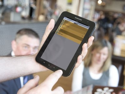 The IUMIS app helps waiters submit orders on the go
