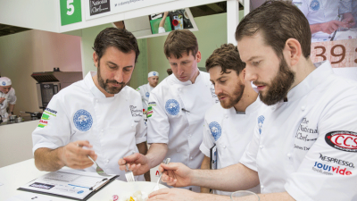 Judges taste dishes at the 2018 competition
