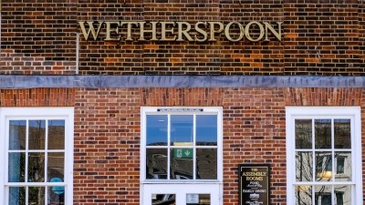 Wetherspoon posts half-year loss as restrictions hit