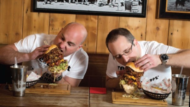 Restaurant's Stefan Chomka (l) and Joe Lutrario (r) attempt Red Dog Saloon's The Devastator Challenge