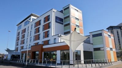 Travelodge has opened its first hotel in Poole and is on the lookout for more sites to expand into in the county