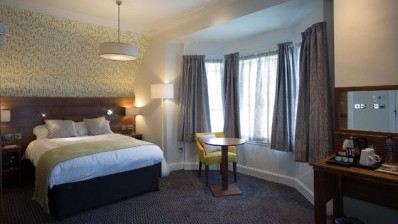 A bedroom at Wetherspoon's hotel The Cross Keys in Peebles. The pub operator is planning to open another four hotels this summer