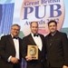 Ross Pike (c), co-founder of The British Larder pub in Suffolk which scooped Best Food Pub at the Great British Pub Awards 2012 hosted by Jason Manford (r)