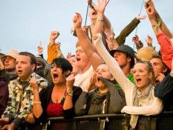 Tourists visiting music festivals and gigs spend £2.2bn doing so, according to the Wish You Were Here report by VisitBritain and UK Music