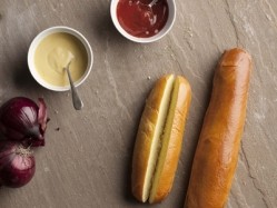 The company's glazed brioche hot dog rolls are made with free range eggs, pure butter and Red Tractor certified flour.