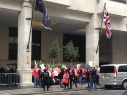 Members of Unite gathered outside the InterContinental on Park Lane yesterday to protest over the living wage