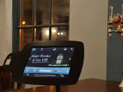 The Robot Pub Group's Robobar self-serve table system features a tablet fixed in the table with an associated beer tap
