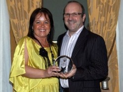 Ann Tysoe of Oak Farm Foods presents Compass's Nick Vadis with the Head of Food award