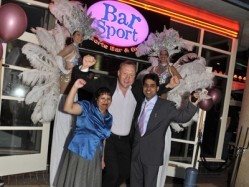 Bar Sport founder Scott Murray (centre) with Bar Sport Merry Hill owners Harry (right) and Neelam Dass
