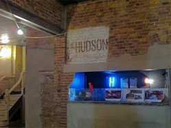 The Hudson's interior design is inspired by urban art with exposed brickwork, neon lights and a rustic vibe
