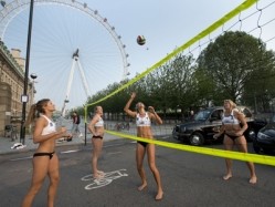 Members of the Team GB female volleyball team stopped traffic at Parliament Square today to show how temporary road closures during the Olympic Games could affect the capital