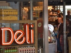 Celebrity chef Jamie Oliver has introduced the first deli to his Jamie's Italian brand at a site in Bath