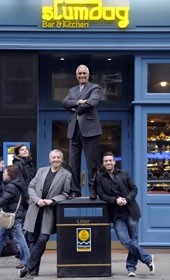 Slumdog Bar & Kitchen owner  Charan Gill  launches his comedy  nights with comedians Chris  Broomfield and Des Clarke