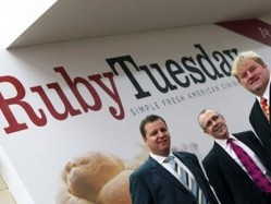 Gary (l) and Stephen Mayo (r) with Steven Madeley, director of St David's Shopping Centre in Cardiff (c), at the opening of the first Ruby Tuesday restaurant in the UK - the second will open in Cheltenham